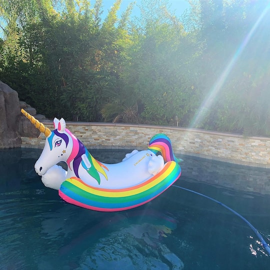 Swim Central 86" Inflatable Rainbow Unicorn Rocker Swimming Pool Float